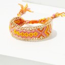 Dame strikket armbånd med øje H625 3