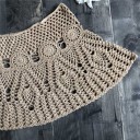Dame strikket mini nederdel Hulmønster med cirkulære motiver Udvidet A-formet snit Snor til binding i taljen Blandingsmateriale af polyester 4