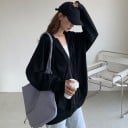 Dame sweatshirt med hætte og lynlås Løst snit med sænkede skuldre Justerbare snore To forreste lommer Ribstrikkede manchetter og kant Bomuld 7