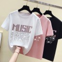Dame T-shirt med dekoration og musikprint 1
