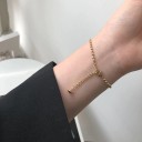 Damearmbånd med kugle og knude 3
