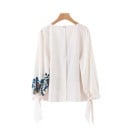 Damebluse med blomsterprint Lange ærmer med snøring ved håndleddet Rund hals Løs pasform Cremehvid Bomuld og polyester 2