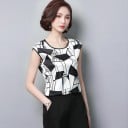 Damebluse uden ærmer med geometrisk mønster Rund halsudskæring med mørk kant Let skinnende polyesterstof Lige snit 2