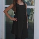 Damebluse uden ærmer med slids i midten Forlænget tanktop-snit Asymmetrisk kant Dekorative knapper Polyester- og bomuldsblanding 14