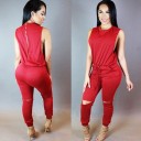 Damejumpsuit med hullede knæ 4