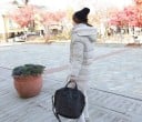 Damen Daunenjacke mit Kapuze und Futter aus Schafwollimitat Längerer Winterschnitt Gestrickte Bündchen Taschen mit Klappe Gestepptes 8