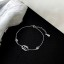 Damen-Kettenarmband mit Ringen 3