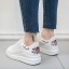 Damen-Sneaker mit einer Blume 1