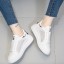 Damen-Sneaker mit einer Blume 4