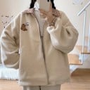 Damen wendbare beige Plüschjacke mit kariertem Kragen und Bärenmotiv. Reißverschluss. Karierte Innenseite. Polyester und Baumwolle 2