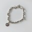 Damenarmband mit Charms 3