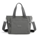 Damentasche für die Hand und über die Schulter Tasche aus Nylon und Polyester mit abnehmbarem Riemen Vordertasche Maße 30 x 27 x 16 cm 4