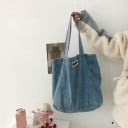 Dames denim schoudertas Ruime stoffen tas van lichtblauwe denim Twee lange hengsels Gequilte naden Afmeting 37 x 39 cm 2