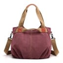 Dames grote canvas handtas voor in de hand of over de schouder Twee textiele handvatten Schouderriem met karabijnen Achterzak met rits 13