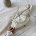 Dames kleine handtas met geplooid zacht ontwerp en decoratieve parelhandgreep Lange dunne schouderband Kunstleer 25 x 13 x 8 cm 1