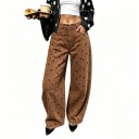Dames losse jeans met stippenprint, brede pijpen en hoge taille, aangevuld met riemlussen en een knoopsluiting 1