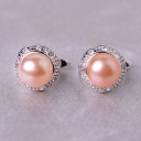 Dames oorbellen met parels en stenen 8