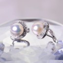 Dames oorbellen met parels en stenen 7