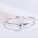 Dames open armband met bloem H113 3