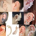Dames opvallende oorbel die het hele oor omarmt Decoratieve oorhanger met zirkonia en imitatieperlen Sieraden van bijouteriekoper Motieven 18