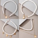 Dames parelketting met hanger D174 1
