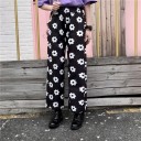 Dames zwart-witte broek met bloemen 1