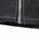 Dames zwarte mini jurk met schouderbanden en kettingen Twee ritsen aan de voorkant Riem met metalen ogen Contrasterend witte stiksels Polyester 4