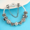 Damesarmband met hangers H612 6