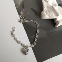 Damesarmband met harthanger H114 3