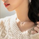 Damhalsband med en kvist och en pärla 5