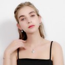 Damhalsband med runt hänge D750 4