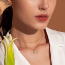 Damhalsband med sol och måne 2