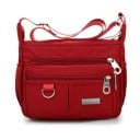 Dámska crossbody kabelka cez rameno z nylonu a polyesteru Dve predné kapsy na zips Nastaviteľný popruh Rozmer 25 x 19 x 9 cm 5
