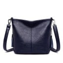 Dámska crossbody kabelka z umelej kože Zrnitý povrch Popruh cez rameno s kovovými karabinami Ozdobné strapce na reťazci 25 x 21 x 10 cm 5