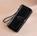Dámska dlhá peňaženka z umelej kože na zips Pútko na zápästie Lesklý povrch Kontrastné prešívanie Predný pásik Rozmer 19 x 9 x 4 cm 1