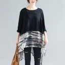 Dámská dlouhá volná blůza s dlouhým rukávem Černý horní díl a průsvitná spodní část s abstraktním vzorem Asymetrický cípatý lem Polyester 4