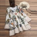 Damska długa bluzka z kwiatowym nadrukiem i długim rękawem. Dekolt w kształcie V z guzikami. Koronkowe wykończenie. Poliester i bawełna. Wygodny 4