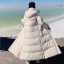 Damska ekstra długa pikowana zimowa kurtka z kapturem i wysokim kołnierzem Długość nad kostkami Prosty krój Boczne kieszenie Poliester 3