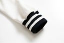 Dámska jarná baseballová bunda v štýle americkej školskej uniformy Kontrastné rukávy Zapínanie na patentky Pruhované úpletové lemy 100% bavlna 14