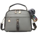 Dámska kabelka do ruky aj cez rameno Nastaviteľný popruh Ozdobná bambula Predná kapsa na zips Zrnitá PU koža 20 x 16 x 9 cm 6