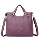 Dámská kabelka do ruky i přes rameno Umělá kůže Prošívané švy Kovové ozdoby na uchách Zapínání na zip Vnitřní kapsy 30 x 12 x 25 cm 3