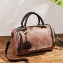 Dámská kabelka do ruky válcového tvaru s popruhem přes rameno Umělá kůže s vintage efektem 25 x 13 x 16 cm Přívěsek ve tvaru růže 3