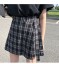 Dámska kockovaná mini sukňa s kraťasy 5
