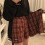 Dámska kockovaná mini sukňa s kraťasy 1