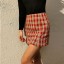 Dámska kockovaná mini sukňa s rozparkami 5