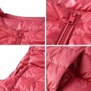 Dámská péřová vesta bez rukávů Kulatý výstřih bez límce Zapínání na zip v celé délce Vodorovné prošívání Výplň z kachního peří Nylon 10