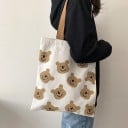 Dámska plátená taška cez rameno s veselým potlačou Zapínanie na zips Vnútorná kapsa Široké hnedé ucha Rozmery 34 x 38 cm Plátno s polyesterom 1