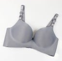 Dámska podprsenka s hladkými tvarovanými košíčkami Nastaviteľné ramienka Zapínanie na háčiky vzadu Vroubkovaný lem Z nylonu a spandexu 3