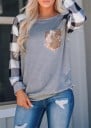 Dámská šedá mikina s náprsní kapsičkou z flitrů Černobílé kostkované raglánové rukávy Kulatý výstřih Lehký materiál polyester a bavlna 1