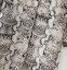 Damska sukienka midi z wężowym wzorem 4